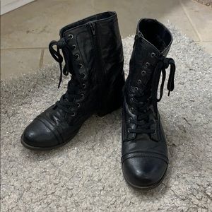 Black leather combat boots